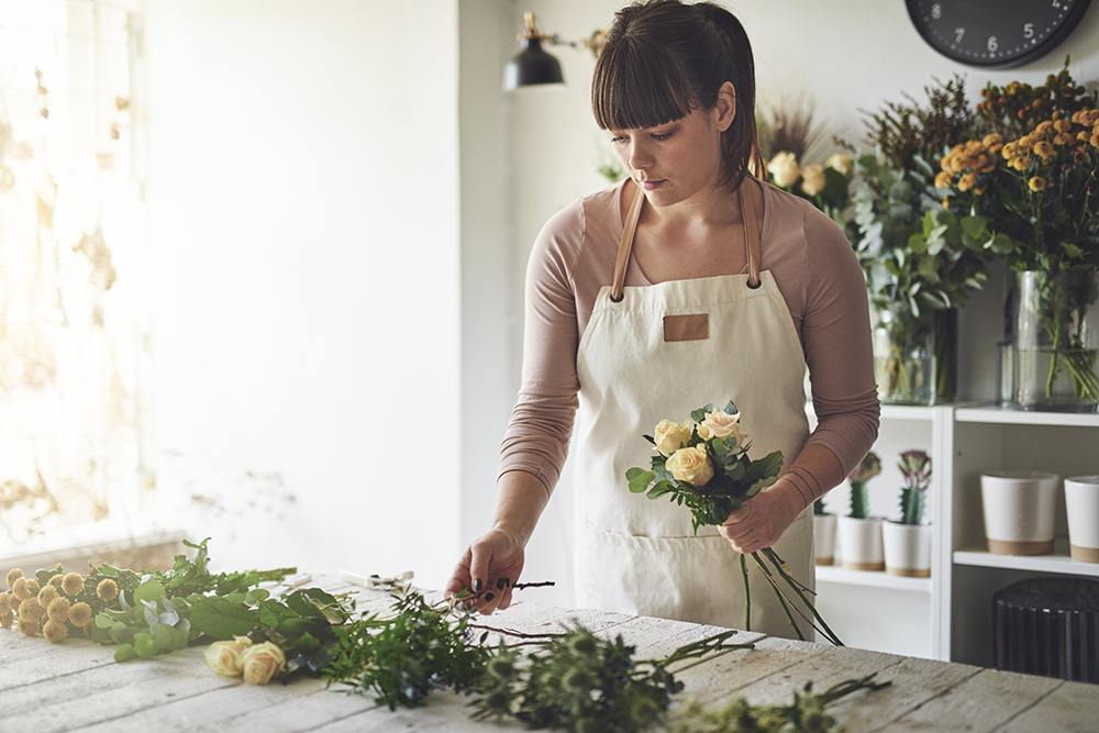 Florist arranging flowers